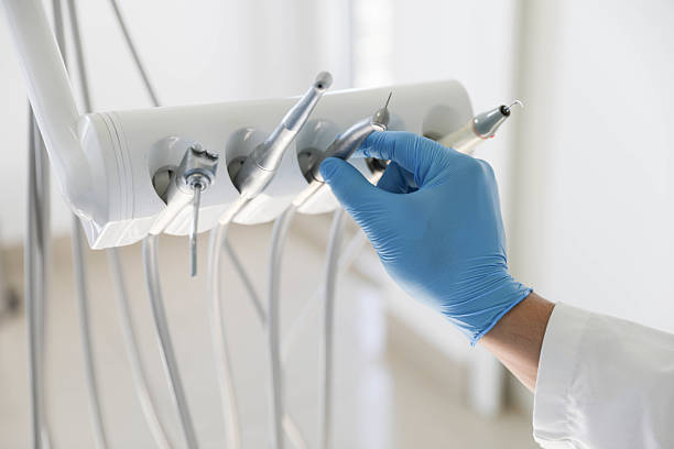 Professional Tooth Extraction technician working in Central Garage, VA